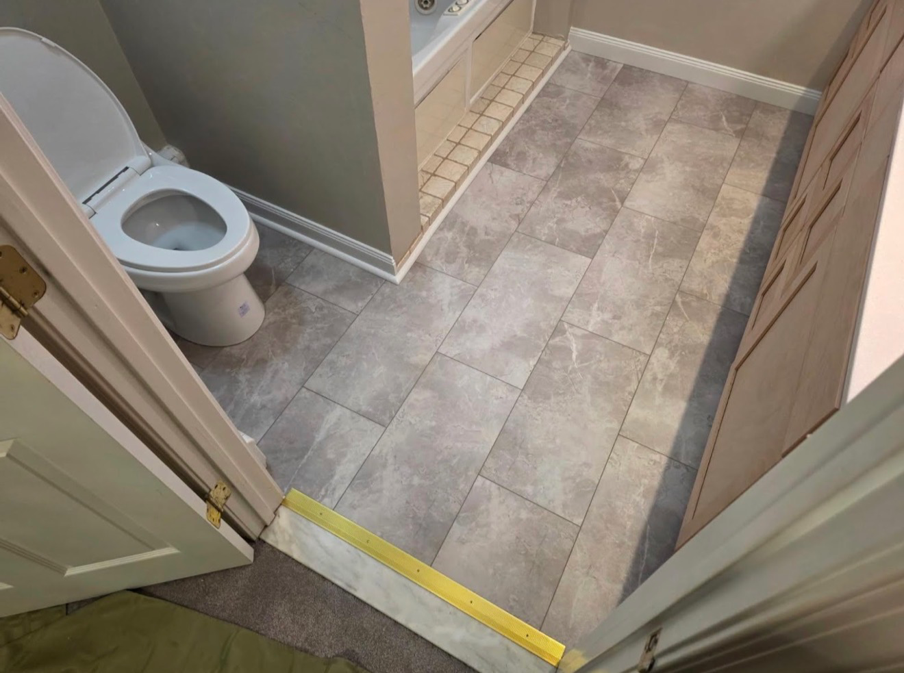 Drywall repair and LVP flooring project by Lancaster Home Handyman